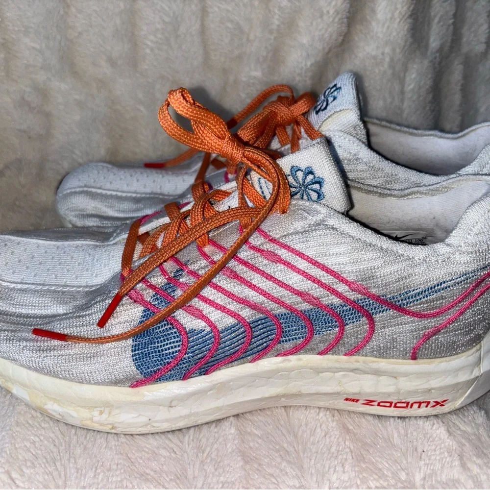 Nike Women's White Running Shoes with Pink, Blue & Orange Accents size 10.5